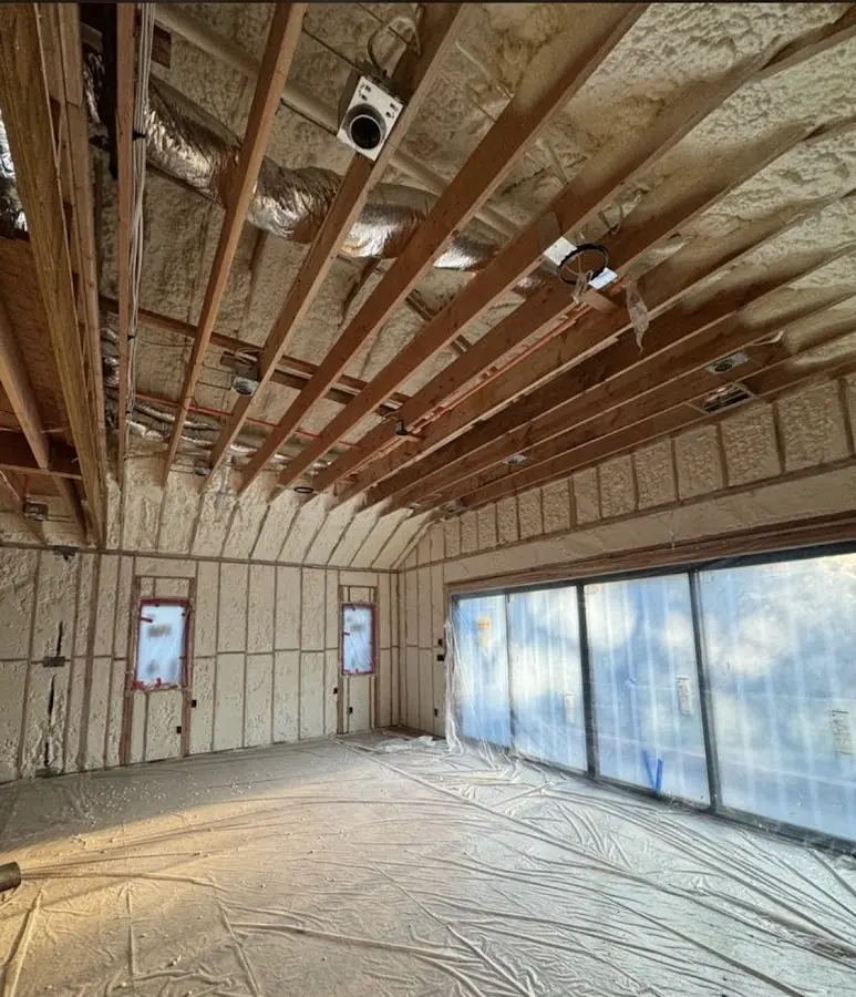 Interior walls and ceiling insulated with spray foam during new construction in Lynchburg, Moore County